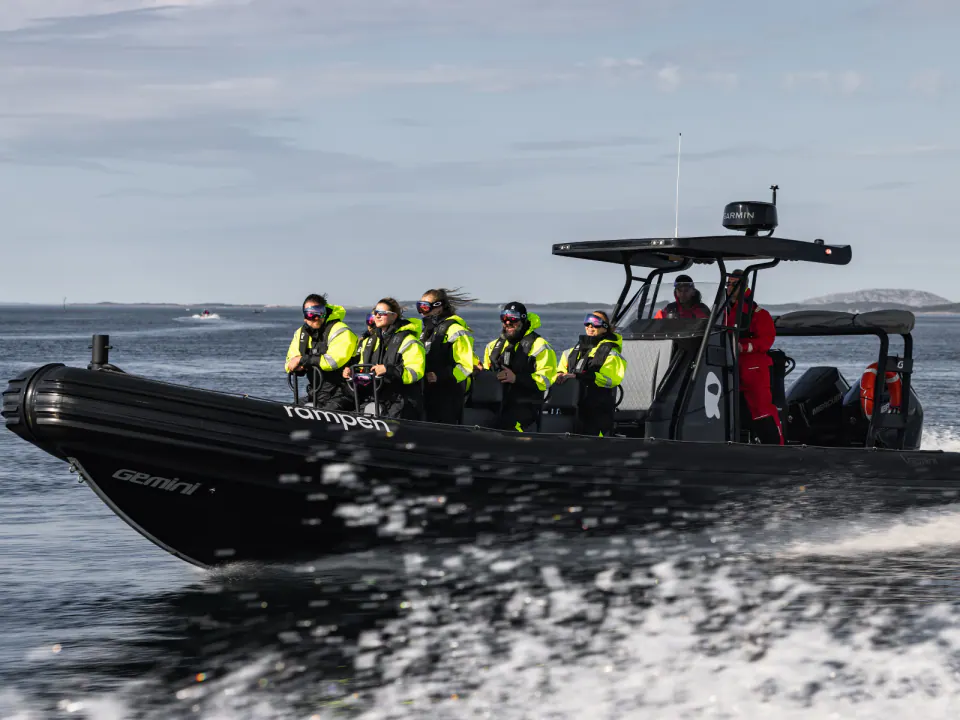 RIB boat speeding through Saltstraumen tidal current in Bodø, Nordland
