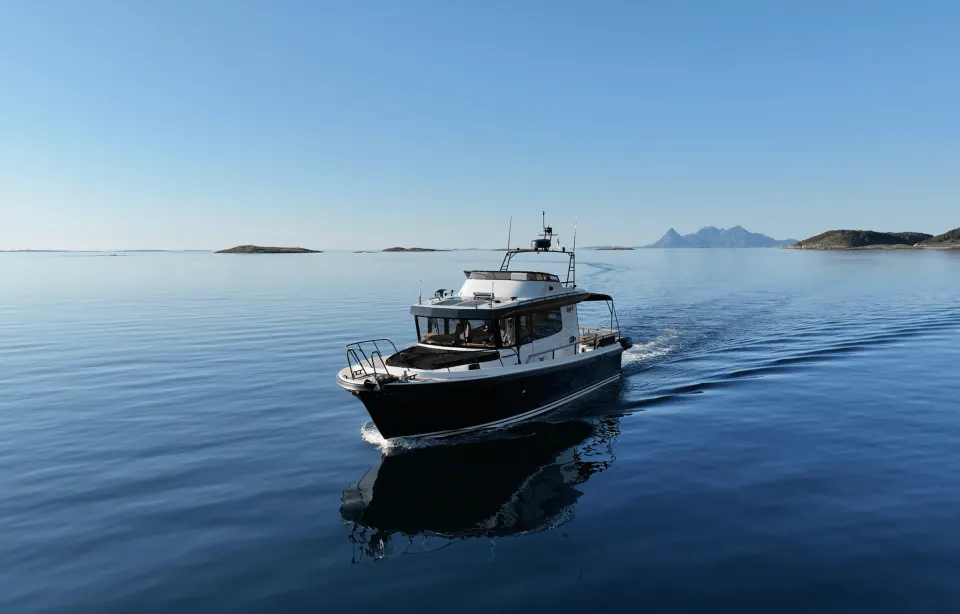 Private charter boat cruising among the islands near Bodø, Nordland